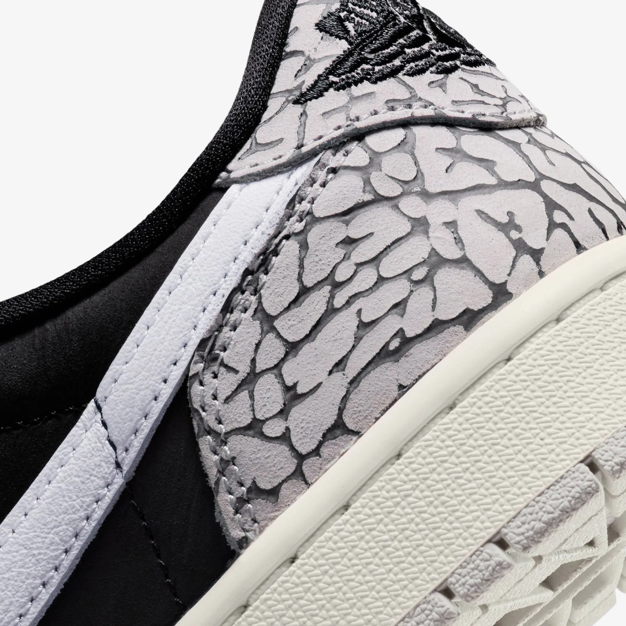 Jordan | WMN'S AIR JORDAN 1 LOW OG  { BLACK/MUSLIN-TECH GREY-WHITE